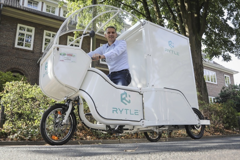 Dr. Arne Kruse auf einem Cargobike